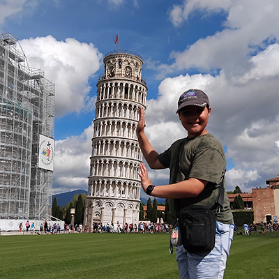 LaithatPisa a young boy looks like he is holding up the Leaning Tower of Pisa but it is just perspective