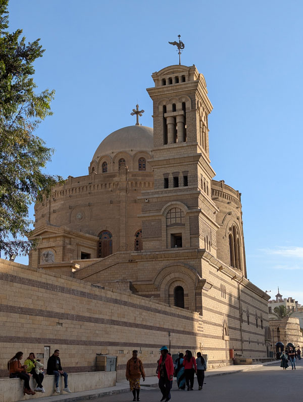 Domed Church with bell tower in brick striped pattern